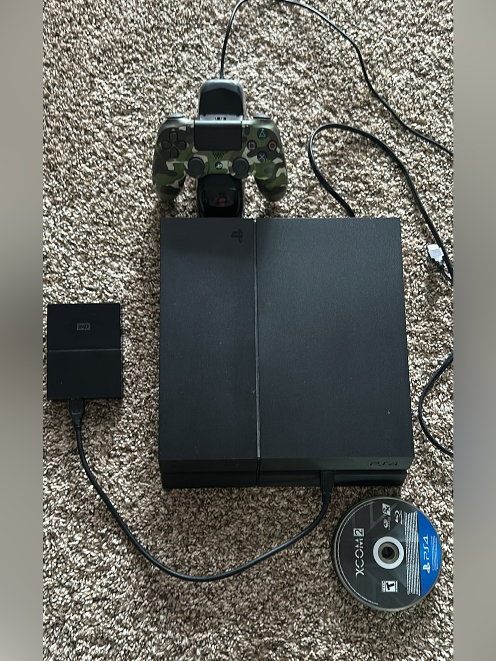 Sony PlayStation 4 Slim Console with Black Finish and Green Camo Controller